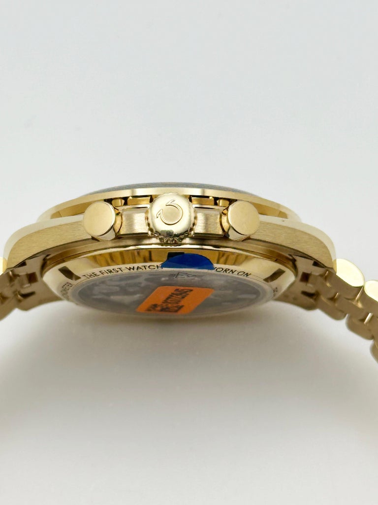 Omega Speedmaster Moonwatch 18k gold with green dial  310.60.42.50.10.001