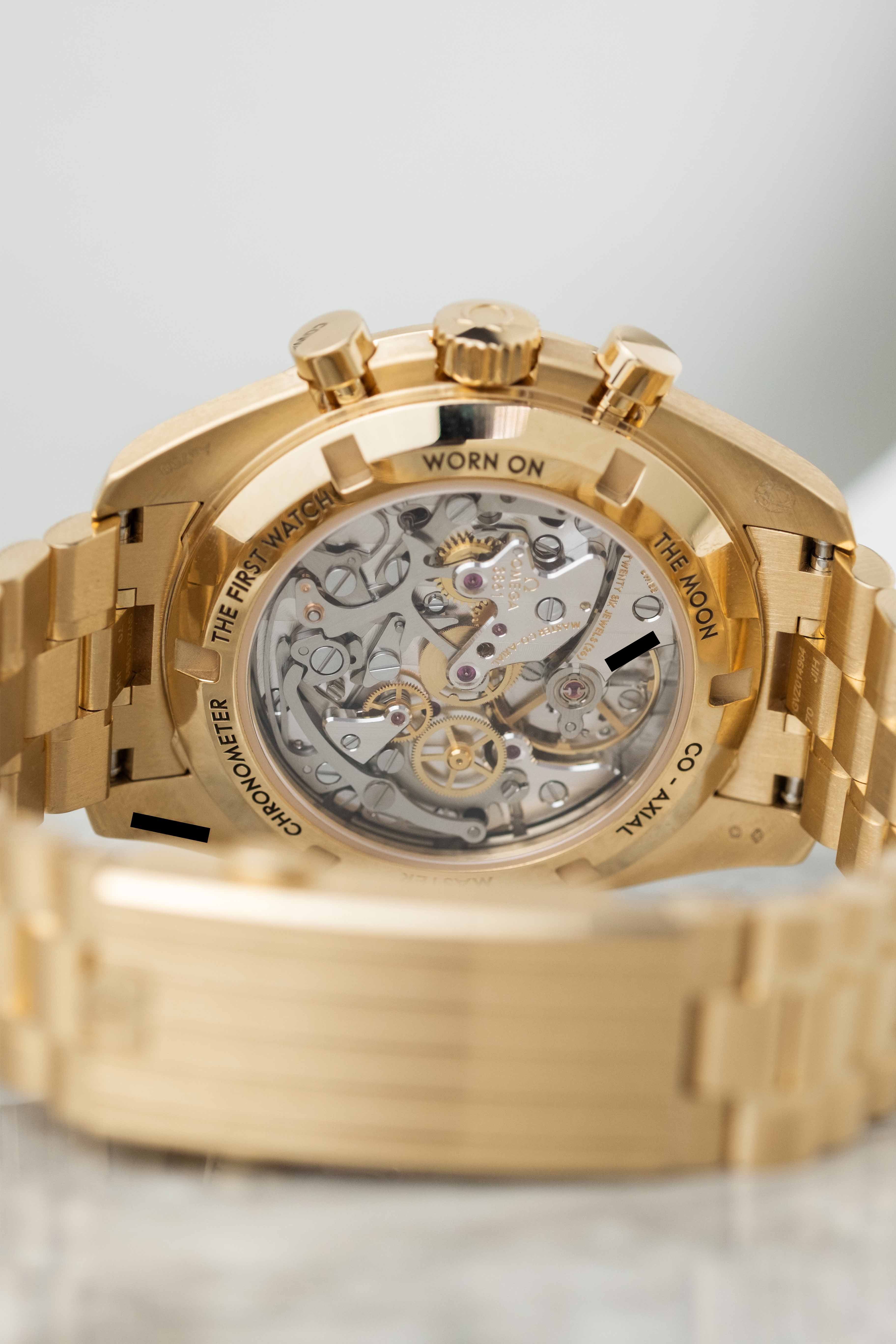 Omega Speedmaster Moonwatch 18k gold with green dial  310.60.42.50.10.001